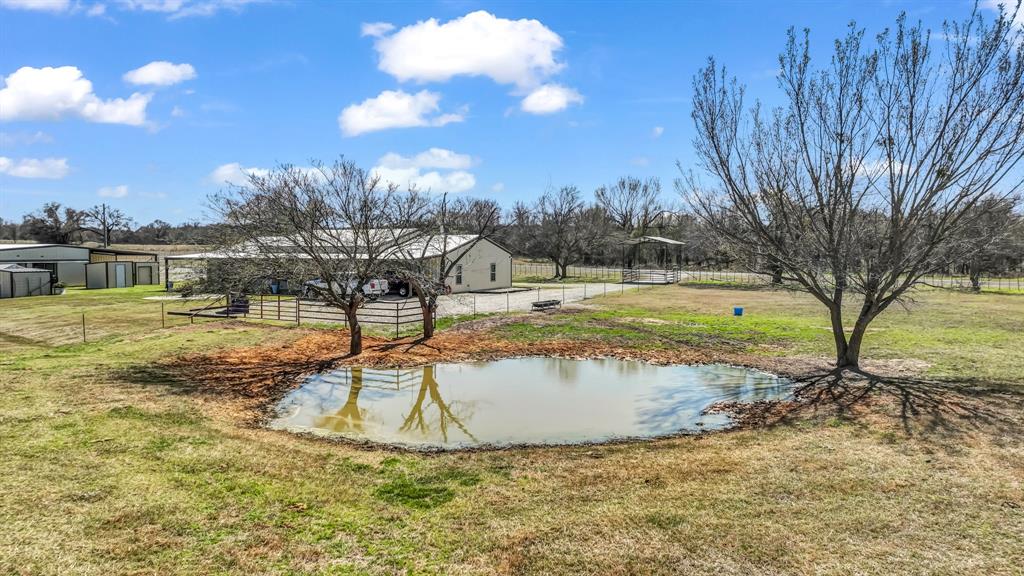 6500 Fm Road, Unit 1885 Weatherford, TX 76088 - Photo 35 of 40 a view of a swimming pool with a yard