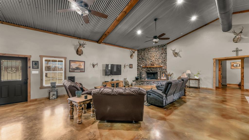 6500 Fm Road, Unit 1885 Weatherford, TX 76088 - Photo 4 of 40 a living room with furniture and a wooden floor