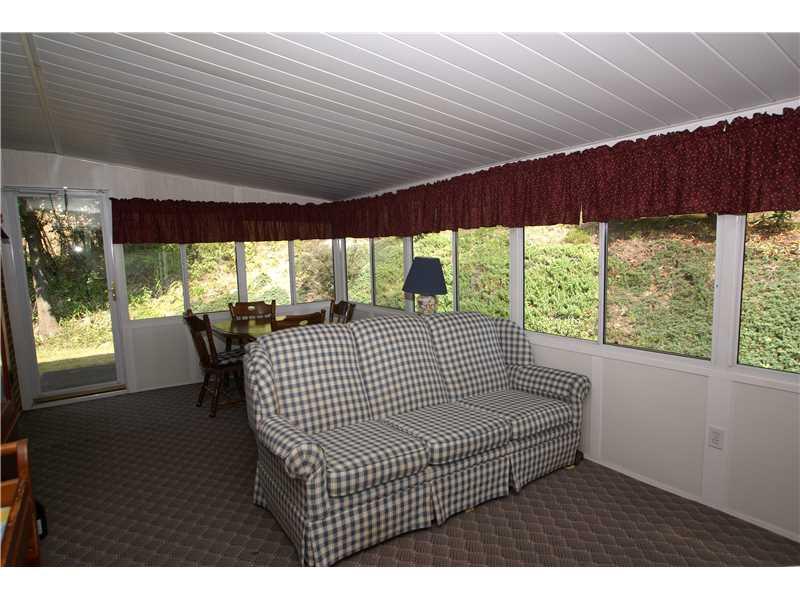 231 Seavey Road Pittsburgh, PA 15223 - Photo 8 of 14 Sunroom. 19X11 3-season room with access to the concrete patio