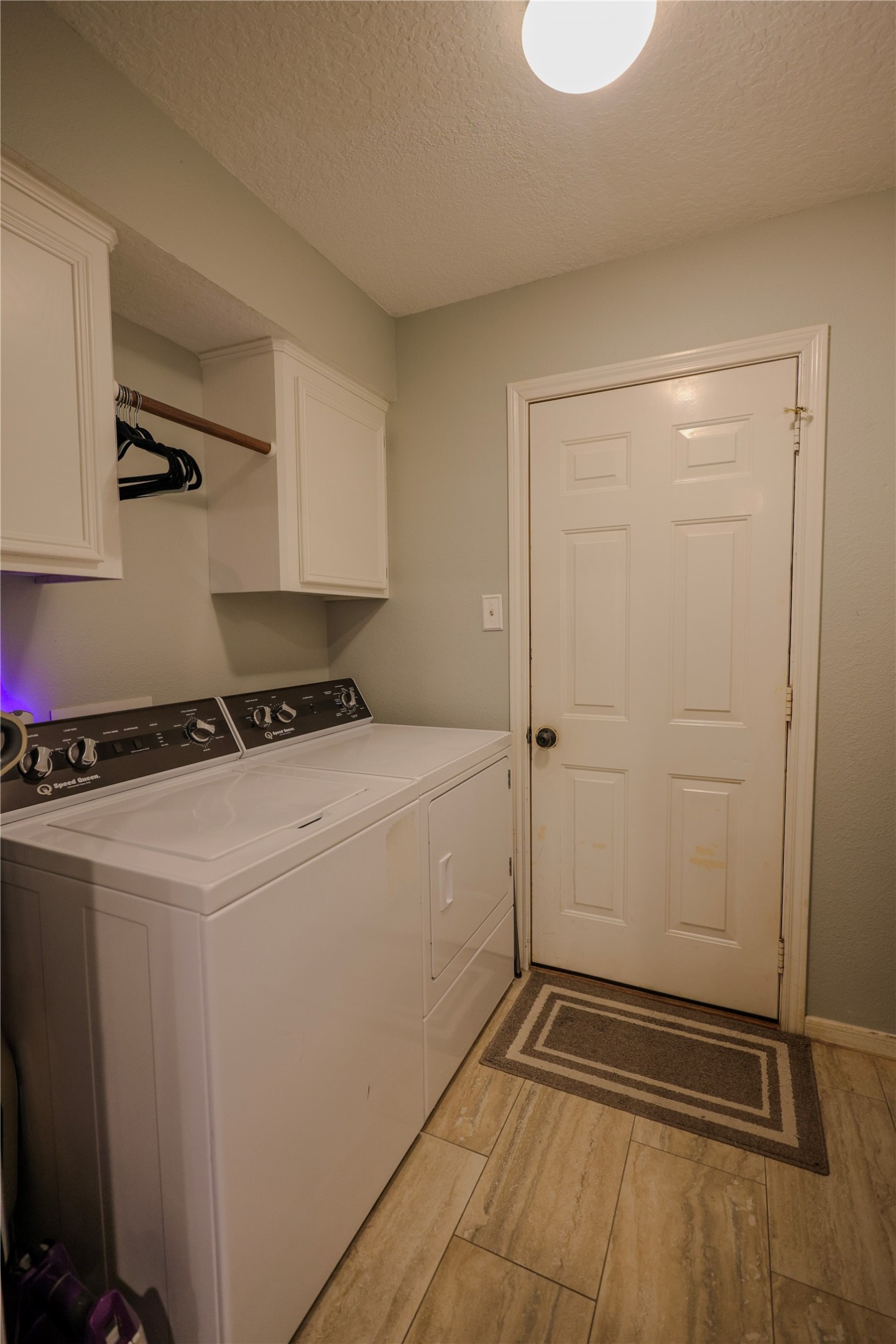 4 Lasso Court Angleton, TX 77515 - Photo 29 of 36 Utility room leading to garage