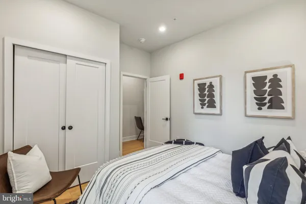 a bedroom with a bed and furniture