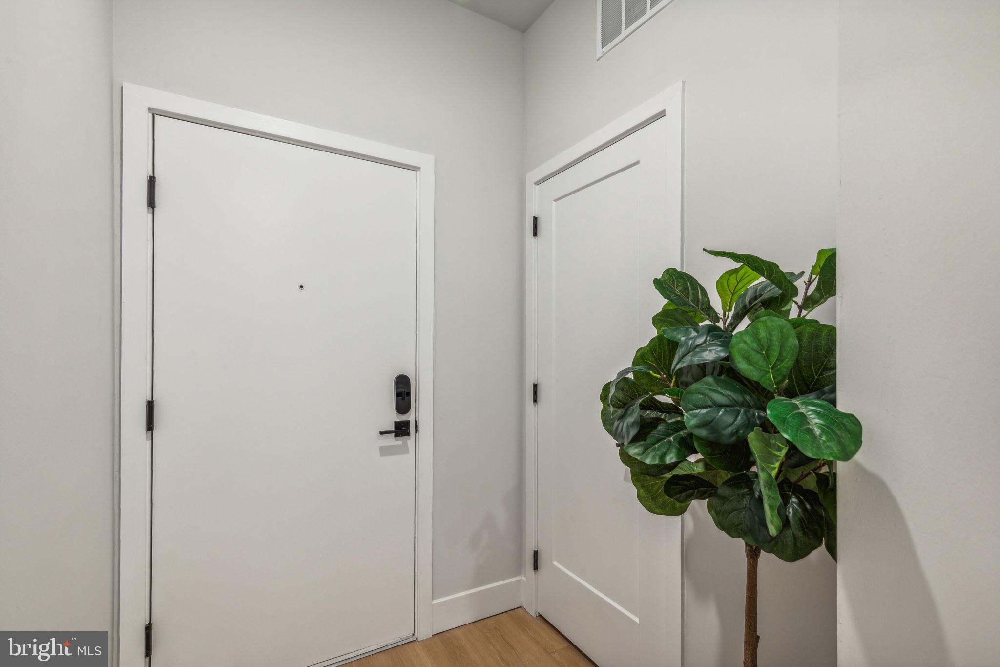 6910 Ridge Avenue, Unit 114 Philadelphia, PA 19128 - Photo 17 of 20 a view of a potted plant in a bathroom