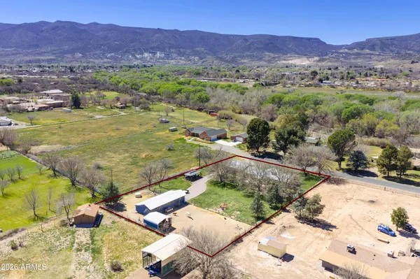 a view of a backyard with a mountain