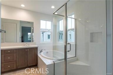 20801 Bur Oak Circle Porter Ranch, CA 91326 - Photo 11 of 35 a bathroom with a granite countertop sink a mirror and shower