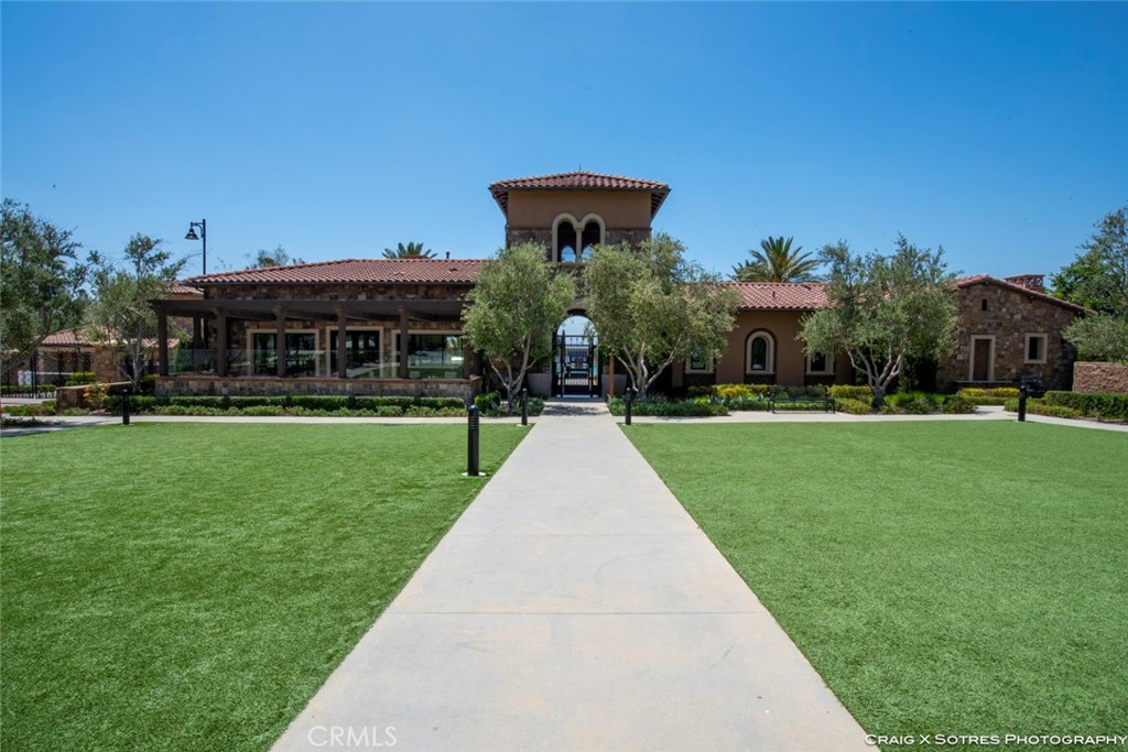 20801 Bur Oak Circle Porter Ranch, CA 91326 - Photo 16 of 35 a front view of a house with garden