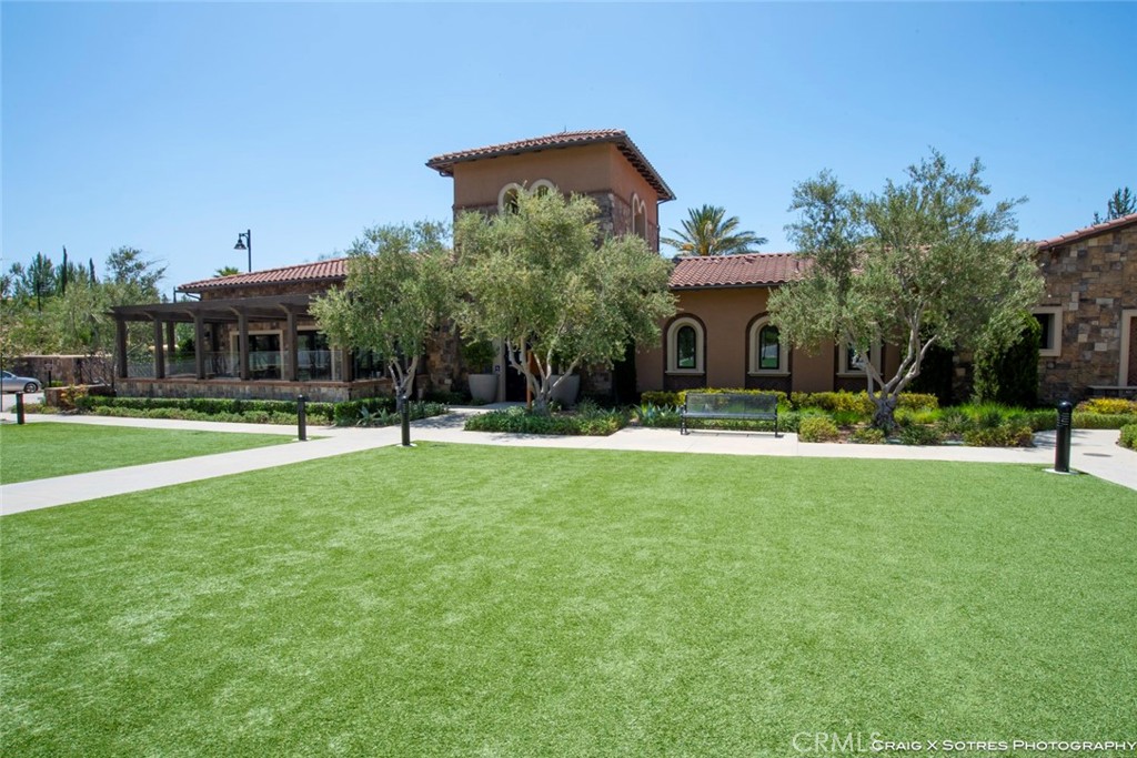 20801 Bur Oak Circle Porter Ranch, CA 91326 - Photo 17 of 35 a front view of a house with a yard