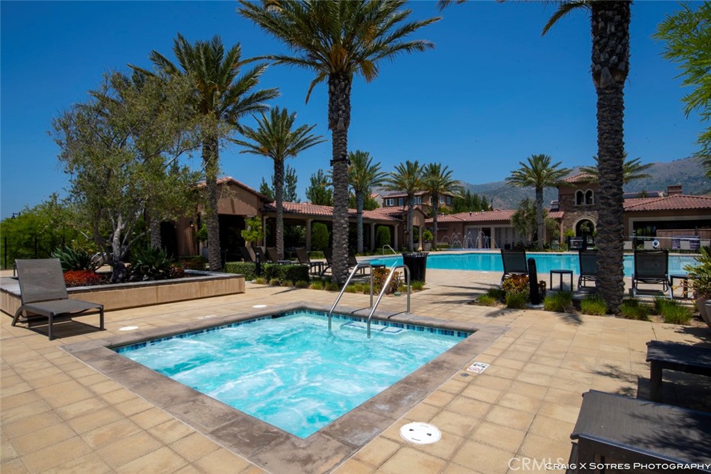20801 Bur Oak Circle Porter Ranch, CA 91326 - Photo 20 of 35 a view of a yard patio and swimming pool