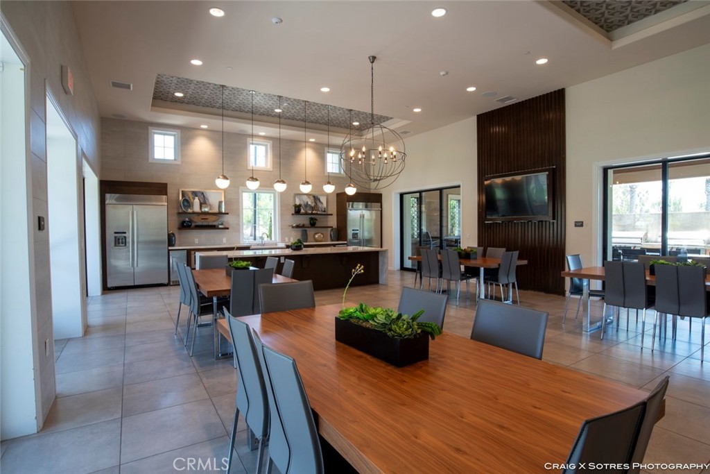 20801 Bur Oak Circle Porter Ranch, CA 91326 - Photo 29 of 35 a view of a dining room with furniture