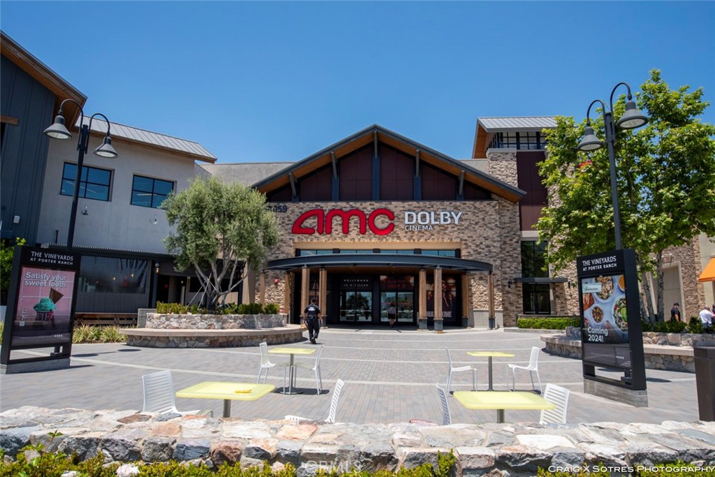 20801 Bur Oak Circle Porter Ranch, CA 91326 - Photo 33 of 35 a view of a cafe with a table and chairs in patio
