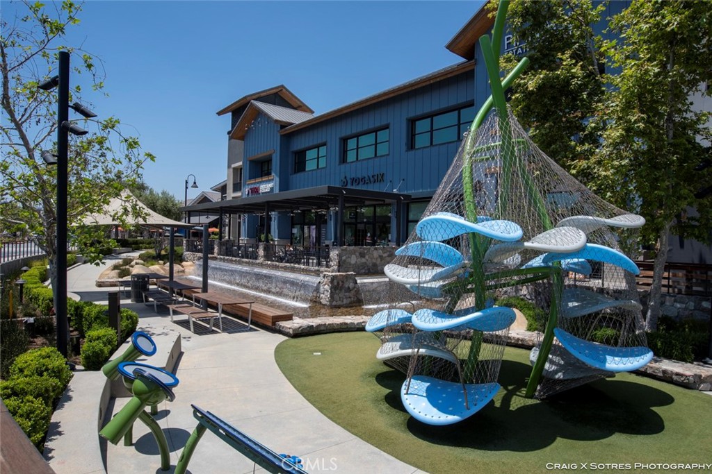 20801 Bur Oak Circle Porter Ranch, CA 91326 - Photo 34 of 35 a view of a house with swimming pool and sitting area