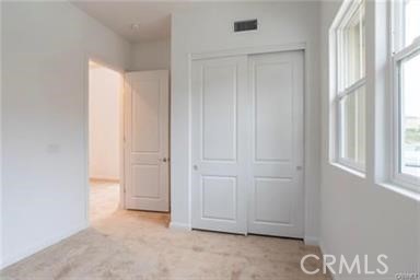 20801 Bur Oak Circle Porter Ranch, CA 91326 - Photo 8 of 35 an empty room with windows