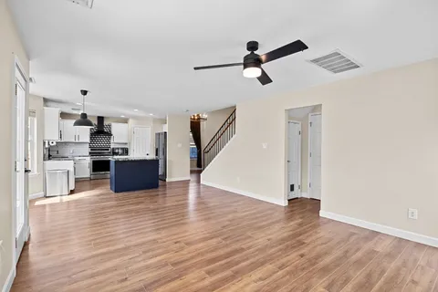 a view interior of the house and kitchen view with wooden floor
