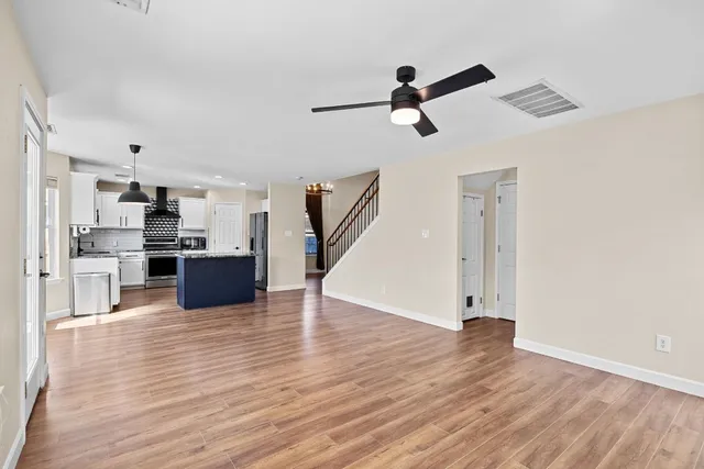 a view interior of the house and kitchen view with wooden floor