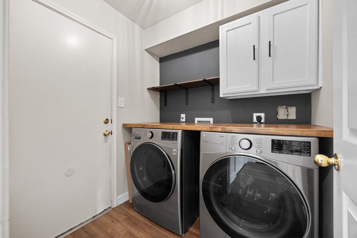 1405 Ty Cobb Place Round Rock, TX 78665 - Photo 18 of 33 a utility room with dryer and washer