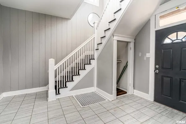a view of an entryway with staircase