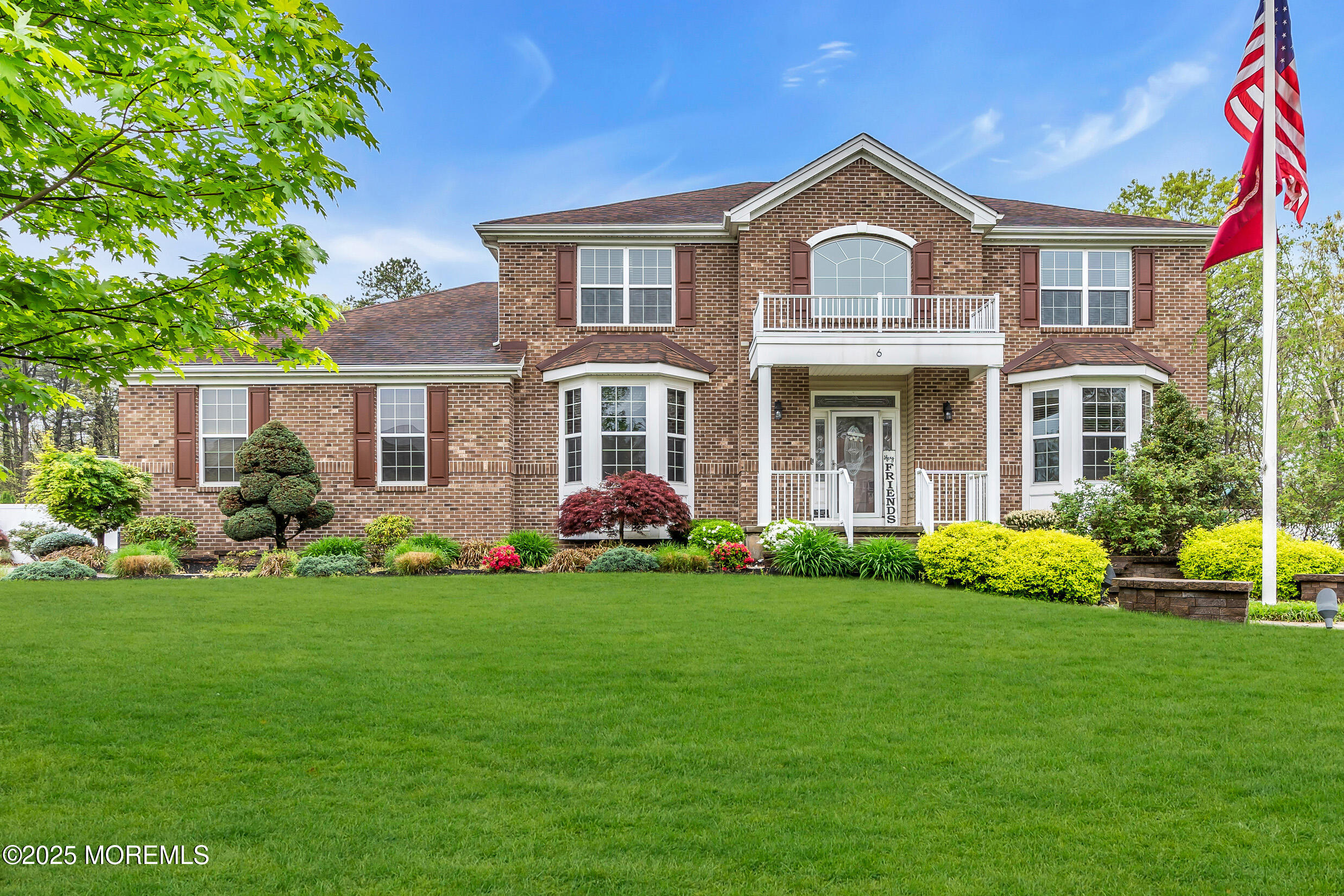 6 Firenze Road Jackson, NJ 08527 - Photo 1 of 57 a front view of a house with a garden