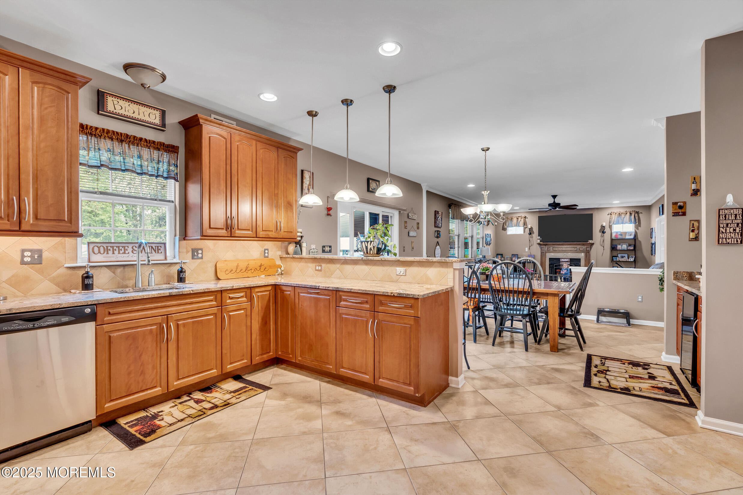 6 Firenze Road Jackson, NJ 08527 - Photo 19 of 57 a kitchen with stainless steel appliances kitchen island granite countertop a sink and cabinets