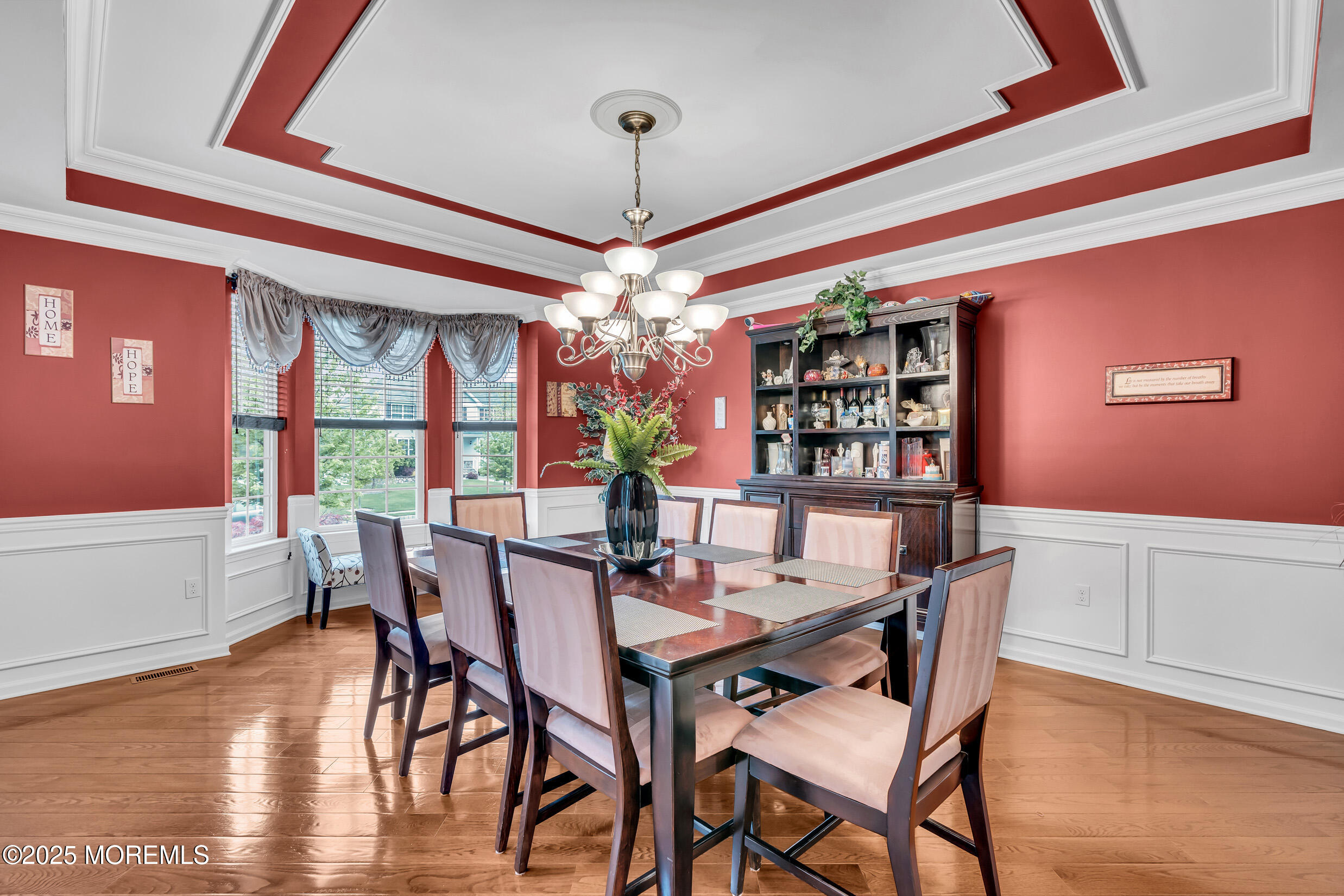 6 Firenze Road Jackson, NJ 08527 - Photo 20 of 57 a view of a dining room with furniture window and wooden floor