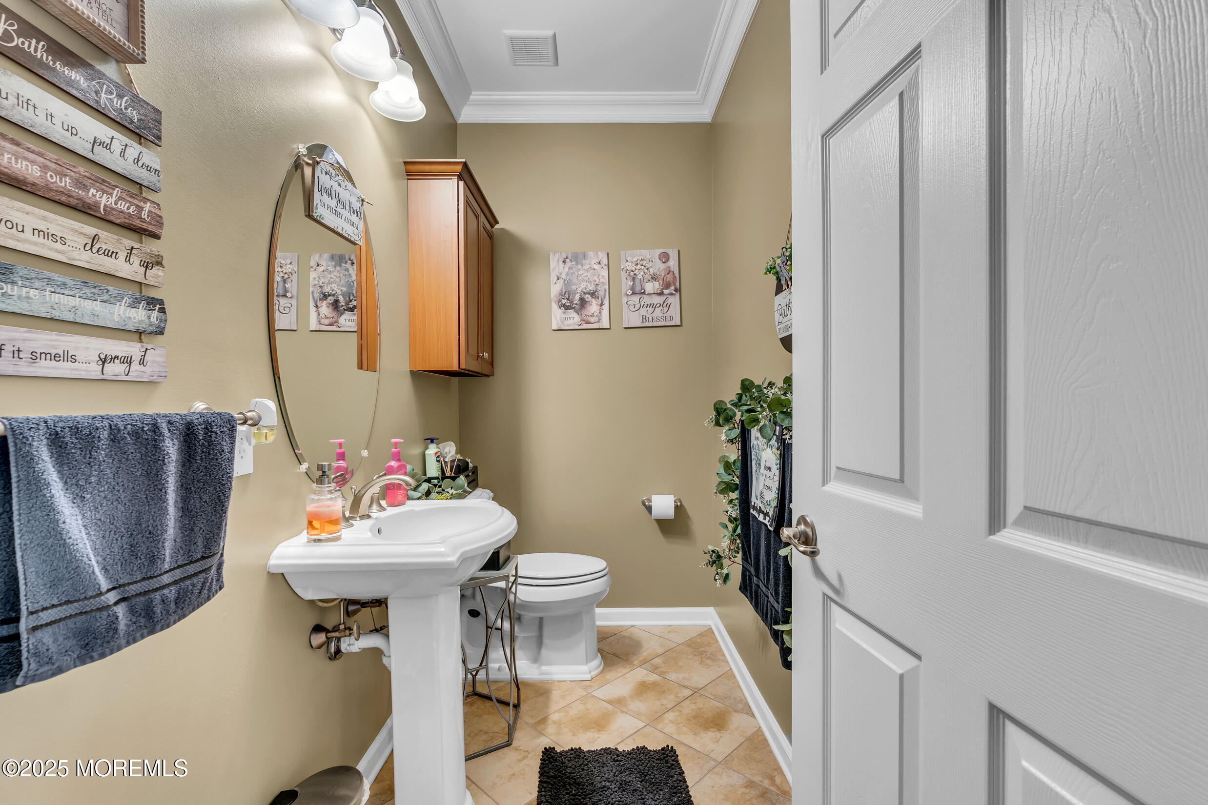6 Firenze Road Jackson, NJ 08527 - Photo 25 of 57 a bathroom with a sink toilet and mirror