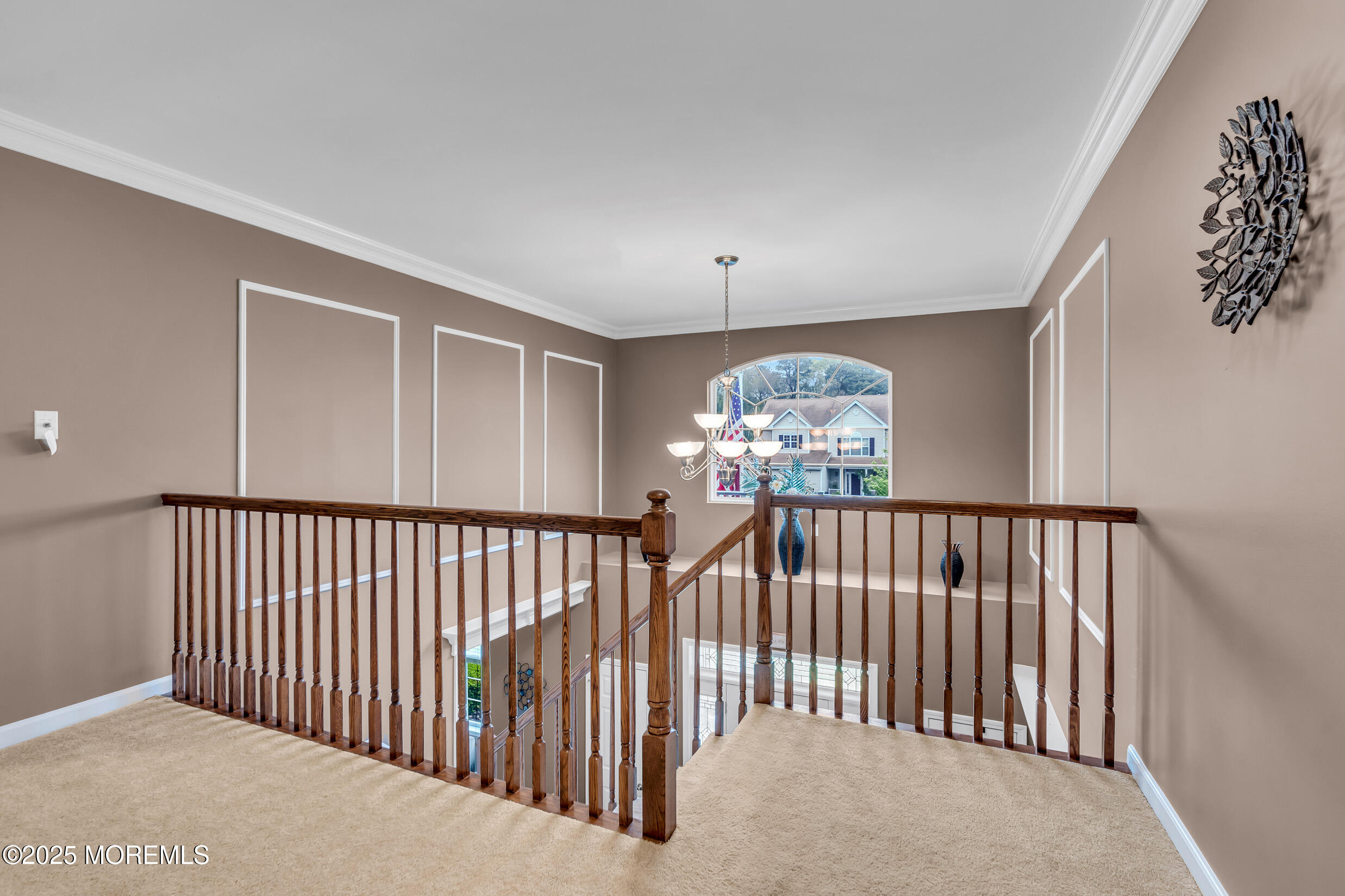 6 Firenze Road Jackson, NJ 08527 - Photo 26 of 57 a view of staircase with railing and a chandelier