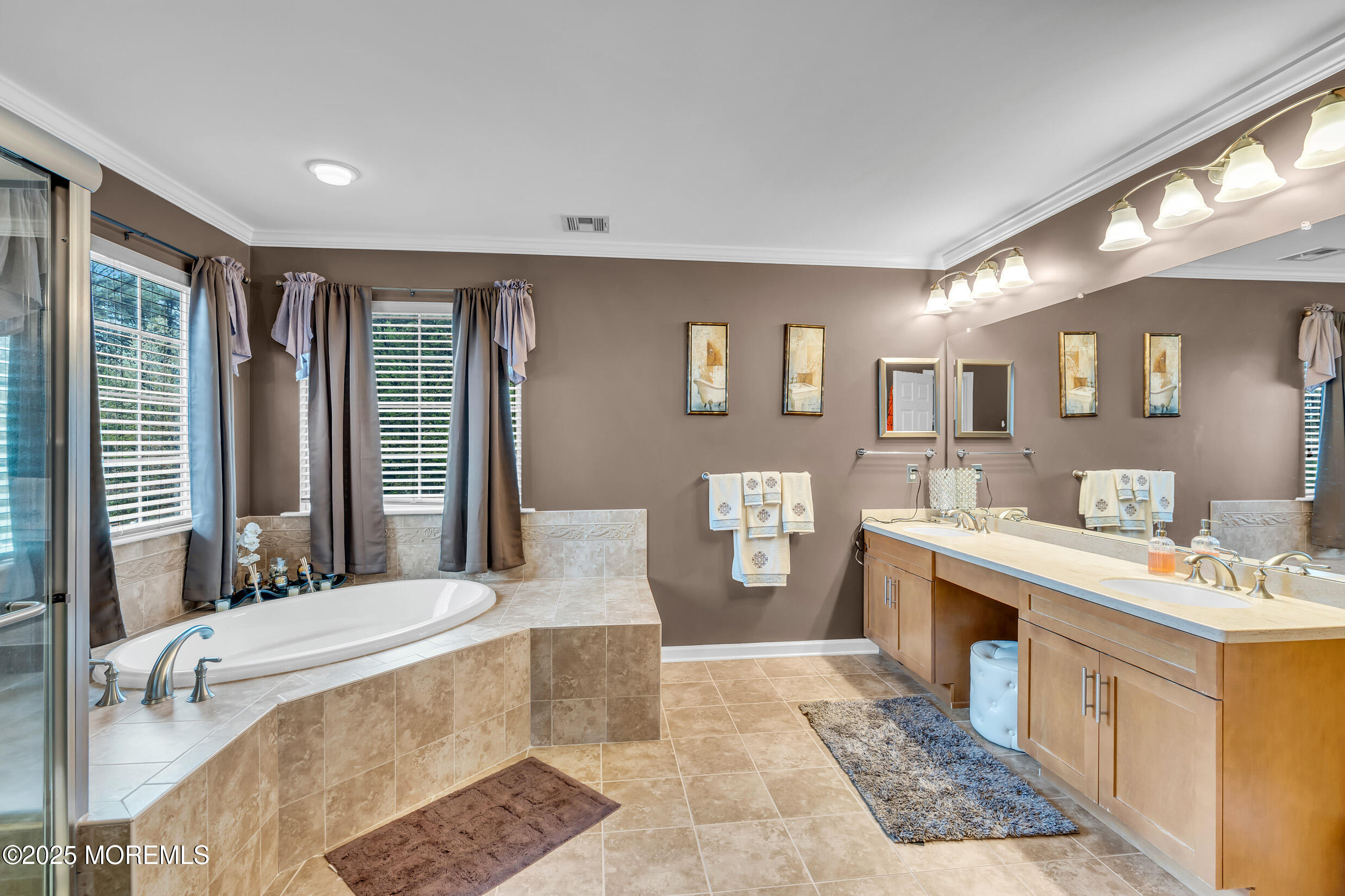 6 Firenze Road Jackson, NJ 08527 - Photo 30 of 57 a spacious bathroom with a tub sink and mirror