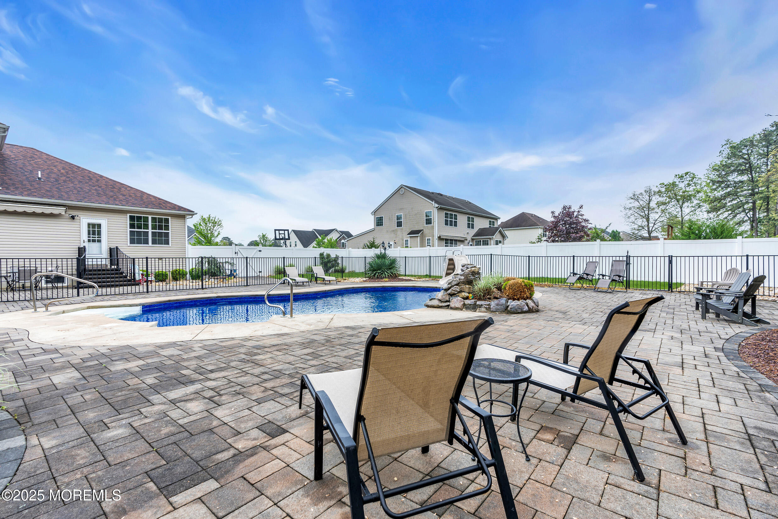 6 Firenze Road Jackson, NJ 08527 - Photo 43 of 57 a view of swimming pool with outdoor seating and city view