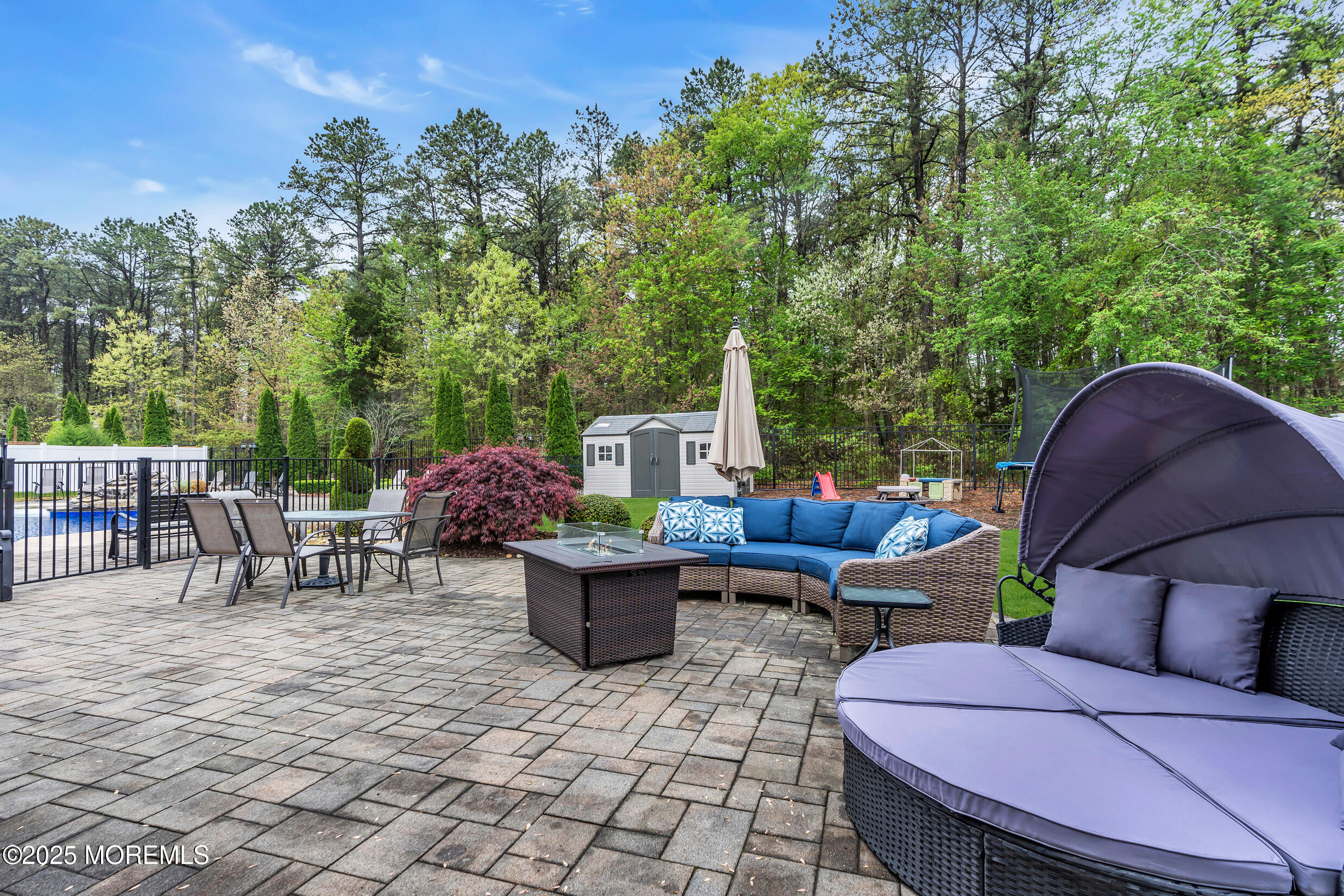 6 Firenze Road Jackson, NJ 08527 - Photo 45 of 57 a backyard of a house with outdoor seating