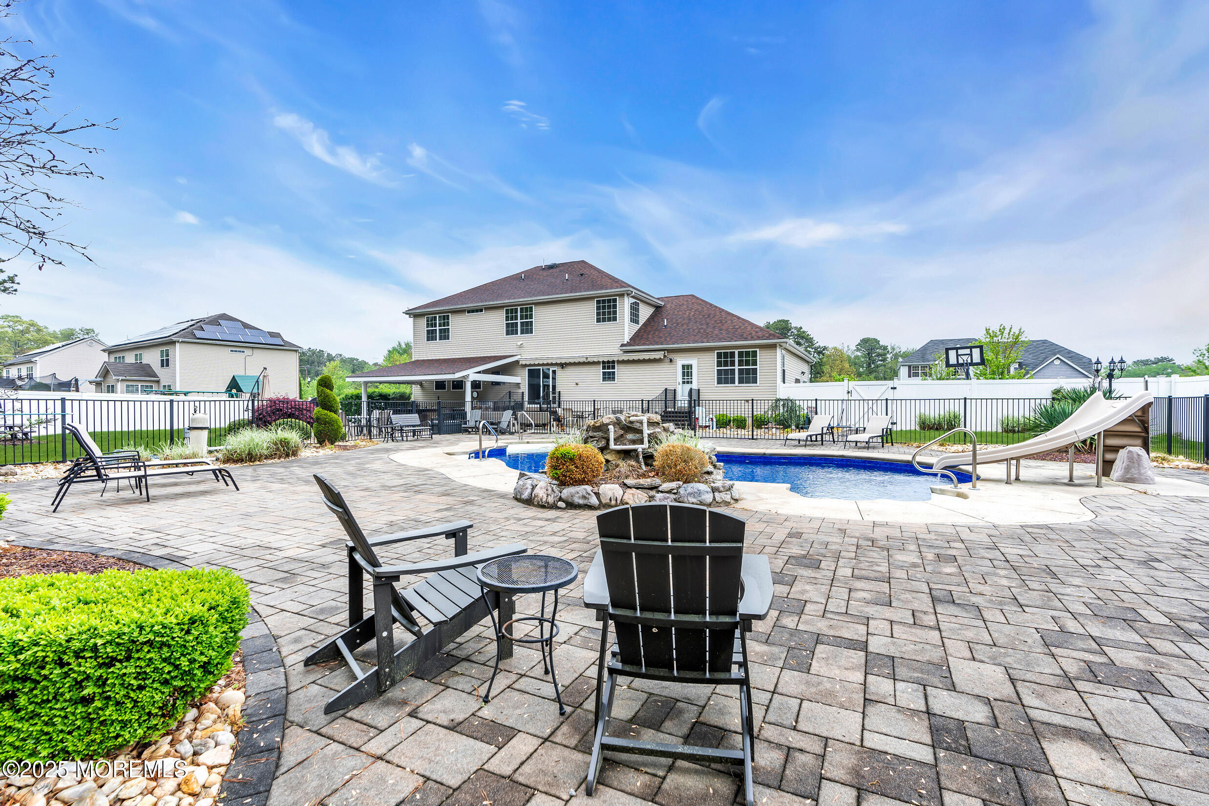 6 Firenze Road Jackson, NJ 08527 - Photo 50 of 57 a view of a patio with chairs and tables