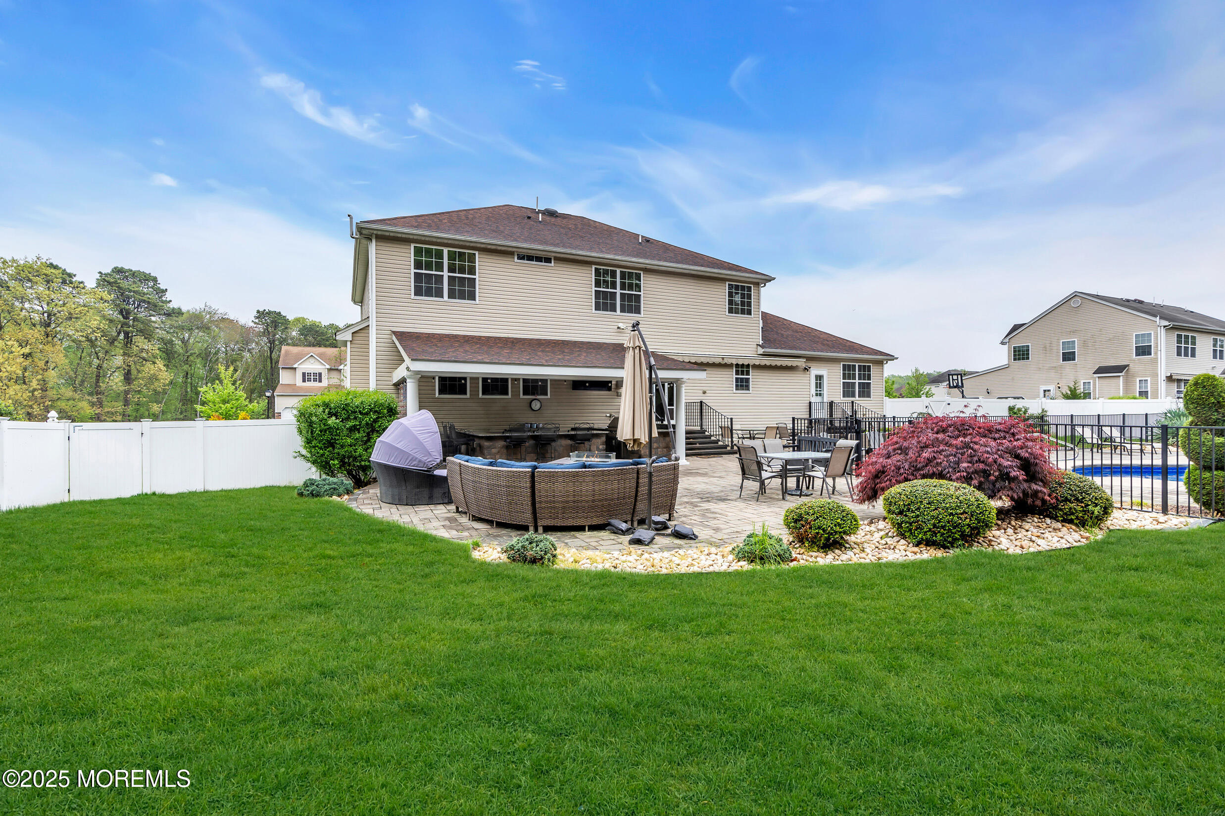 6 Firenze Road Jackson, NJ 08527 - Photo 52 of 57 a front view of a house with garden and trees