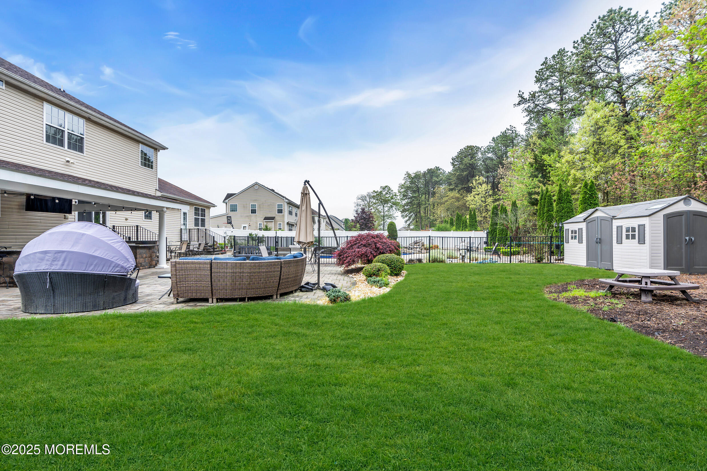 6 Firenze Road Jackson, NJ 08527 - Photo 54 of 57 a view of a house with a big yard and a large trees