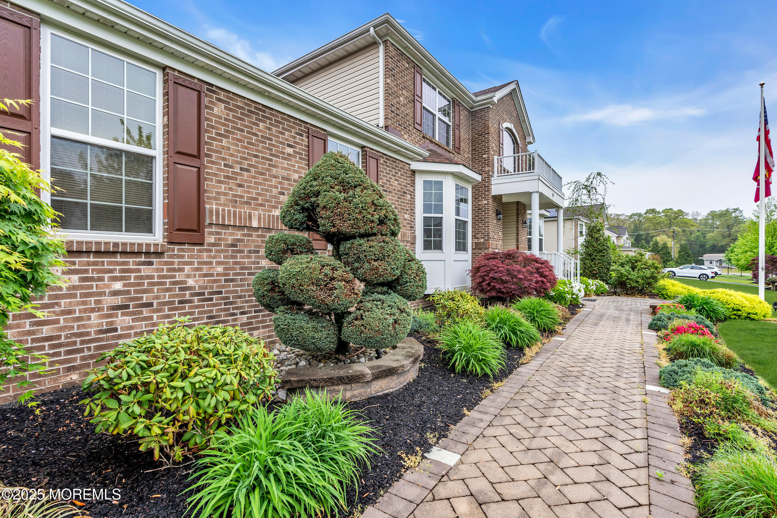 6 Firenze Road Jackson, NJ 08527 - Photo 7 of 57 a front view of a house with garden