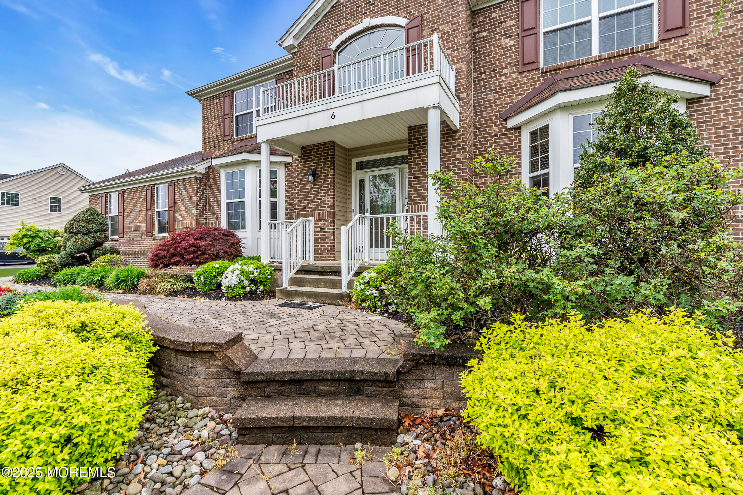 6 Firenze Road Jackson, NJ 08527 - Photo 8 of 57 front view of a house with a yard