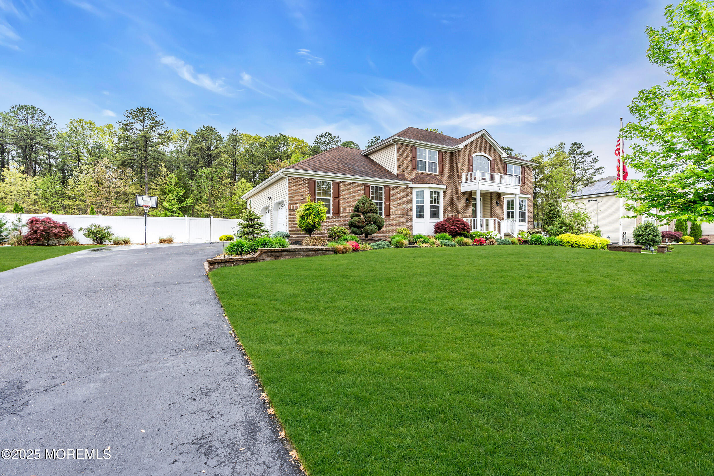 6 Firenze Road Jackson, NJ 08527 - Photo 10 of 57 a front view of a house with a yard