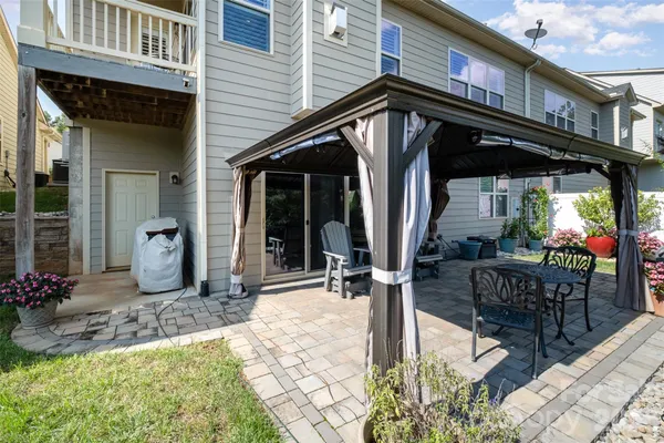 a front view of a house with patio