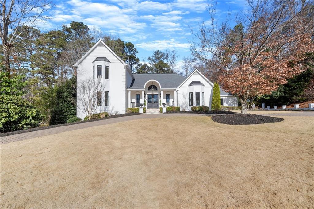 4727 Maple Brook Marietta, GA 30067 - Photo 1 of 1 a view of white house with a yard