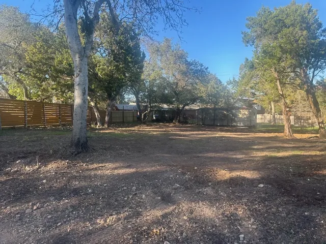 a view of road with trees