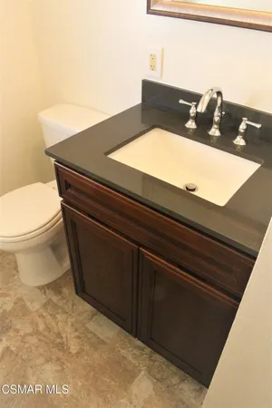a bathroom with a toilet