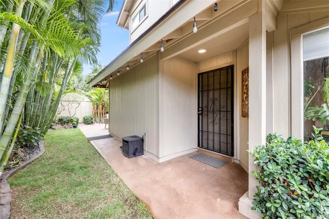 a view of a back yard of the house