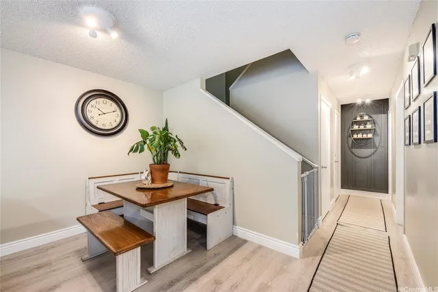 a view of dining room with wooden floor