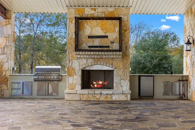 a backyard of apartments with large trees