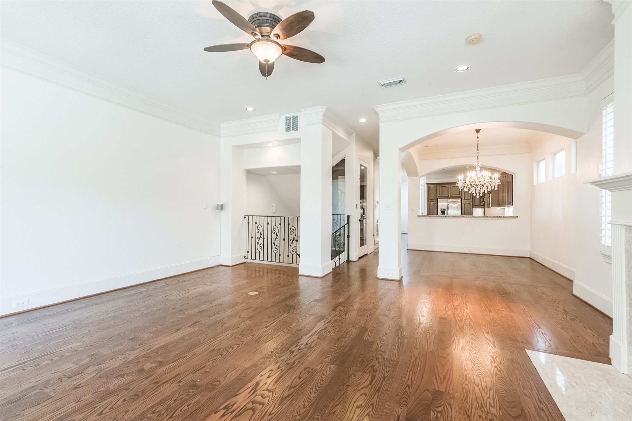 407 West Bell Street Houston, TX 77019 - Photo 19 of 49 wooden floor in an empty room with a window