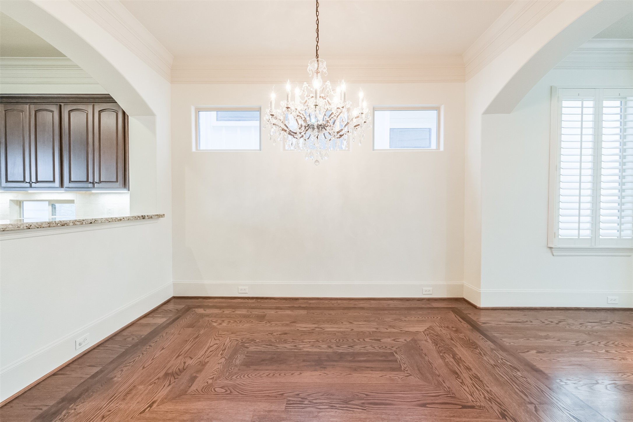 407 West Bell Street Houston, TX 77019 - Photo 21 of 49 a view of an empty room with wooden floor and a window