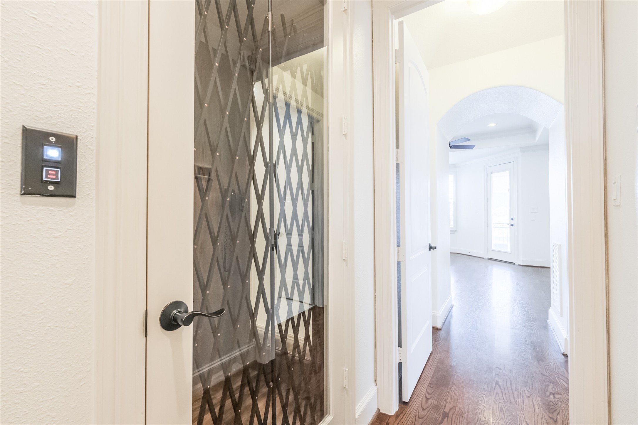 407 West Bell Street Houston, TX 77019 - Photo 33 of 49 a view of a hallway with wooden floor