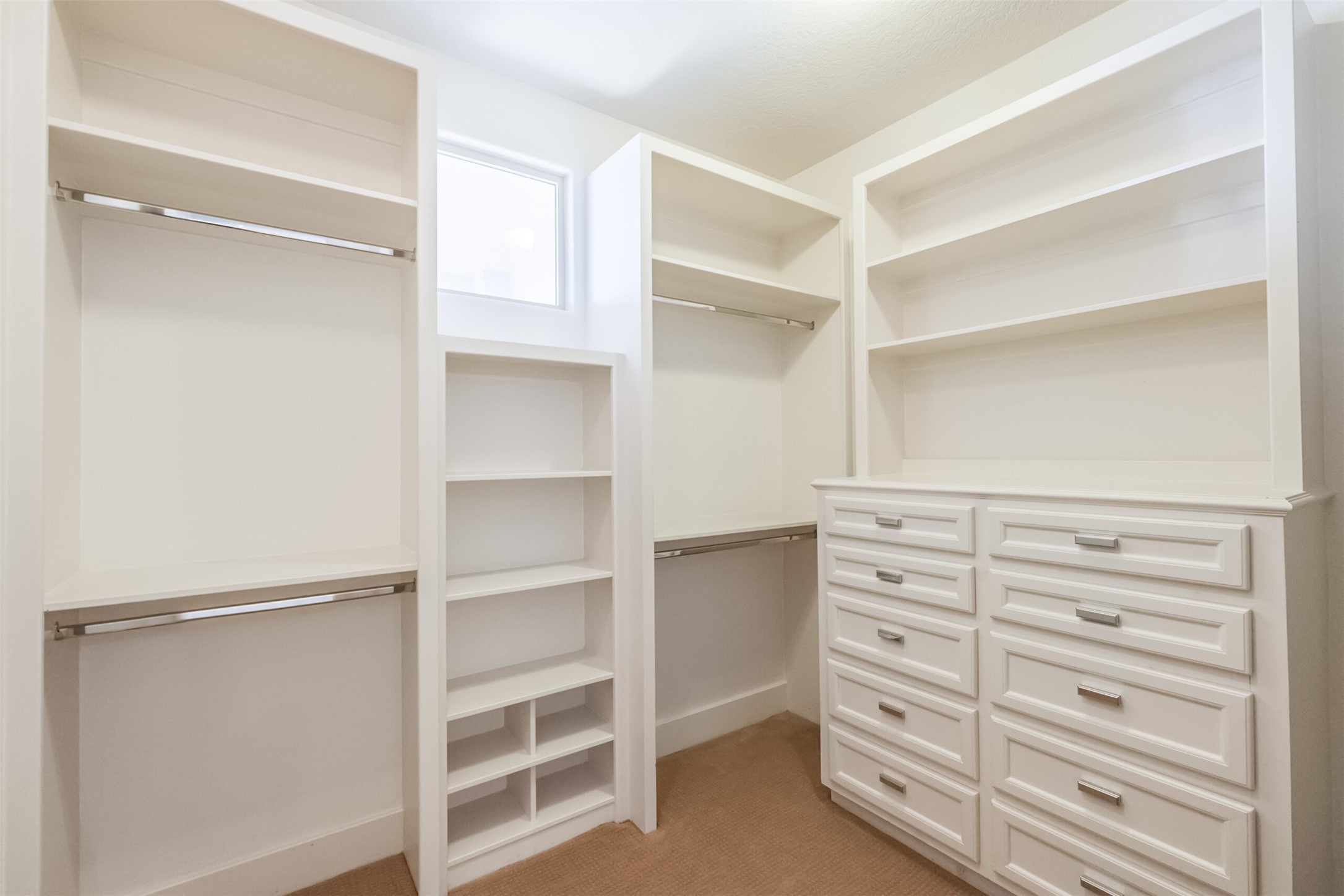 407 West Bell Street Houston, TX 77019 - Photo 43 of 49 a view of walk in closet with empty racks