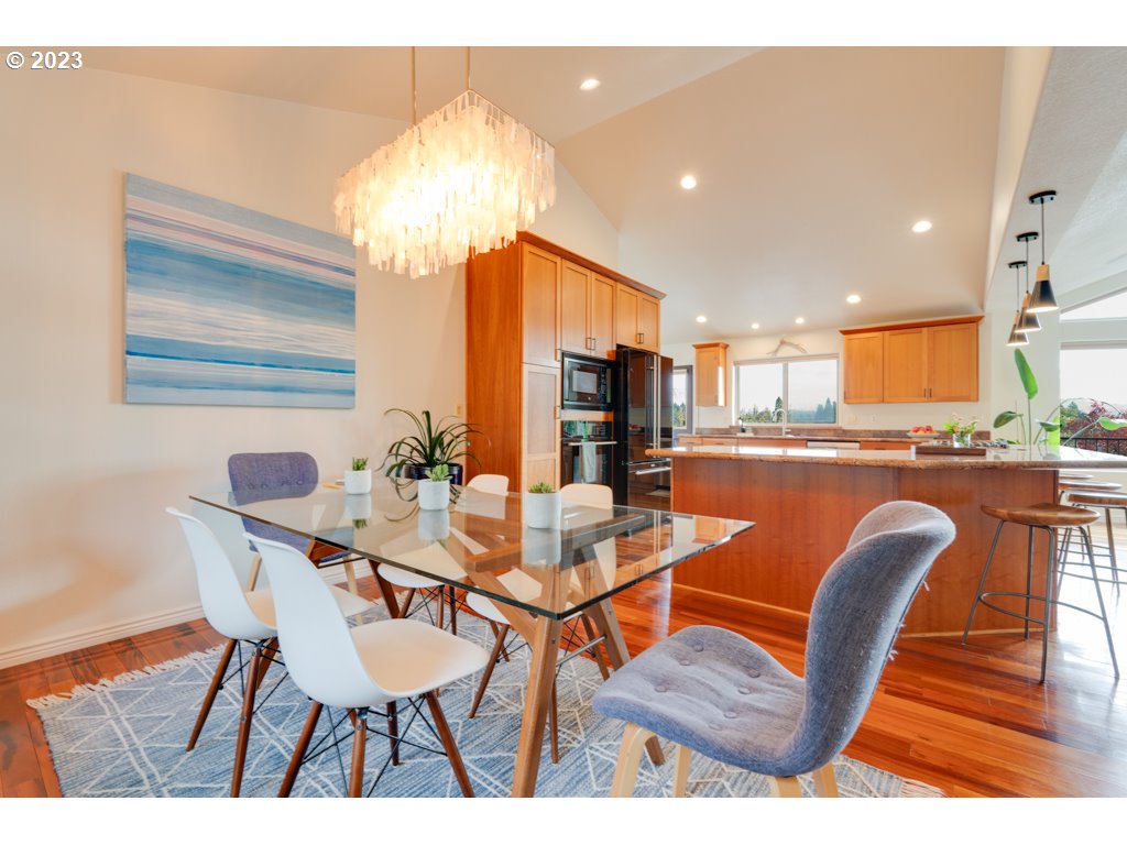3250 P Street Washougal, WA 98671 - Photo 15 of 48 a dining room with furniture and chandelier