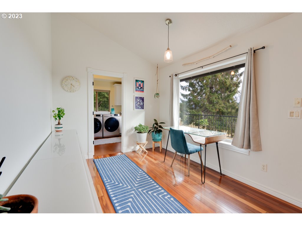 3250 P Street Washougal, WA 98671 - Photo 17 of 48 a living room with furniture and a large window