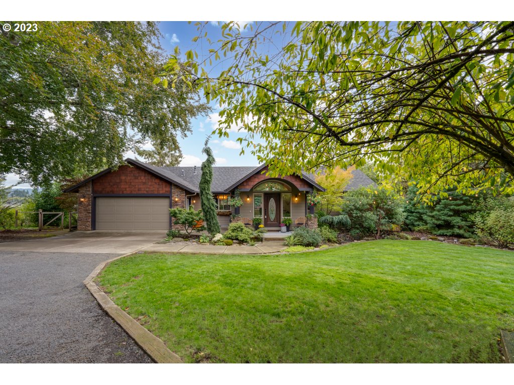 3250 P Street Washougal, WA 98671 - Photo 2 of 48 a view of a house with a yard and sitting area