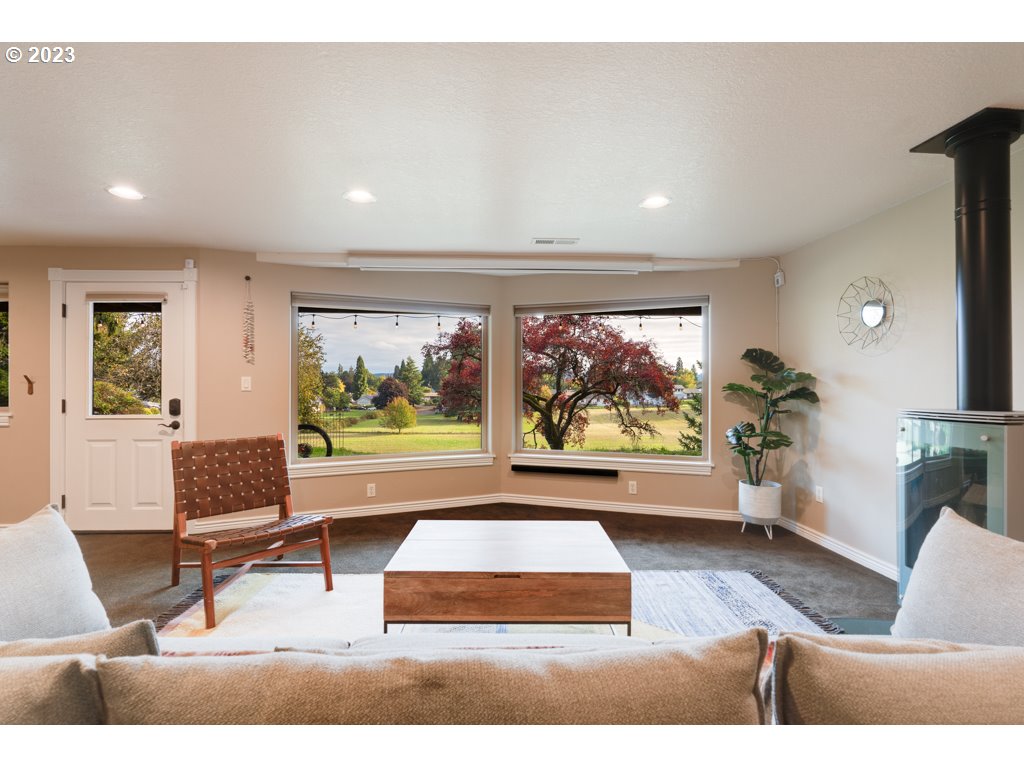 3250 P Street Washougal, WA 98671 - Photo 31 of 48 a living room with furniture and a large window