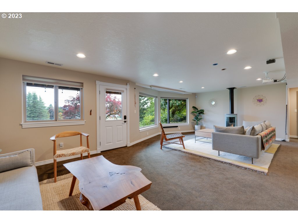 3250 P Street Washougal, WA 98671 - Photo 32 of 48 a living room with furniture and a window