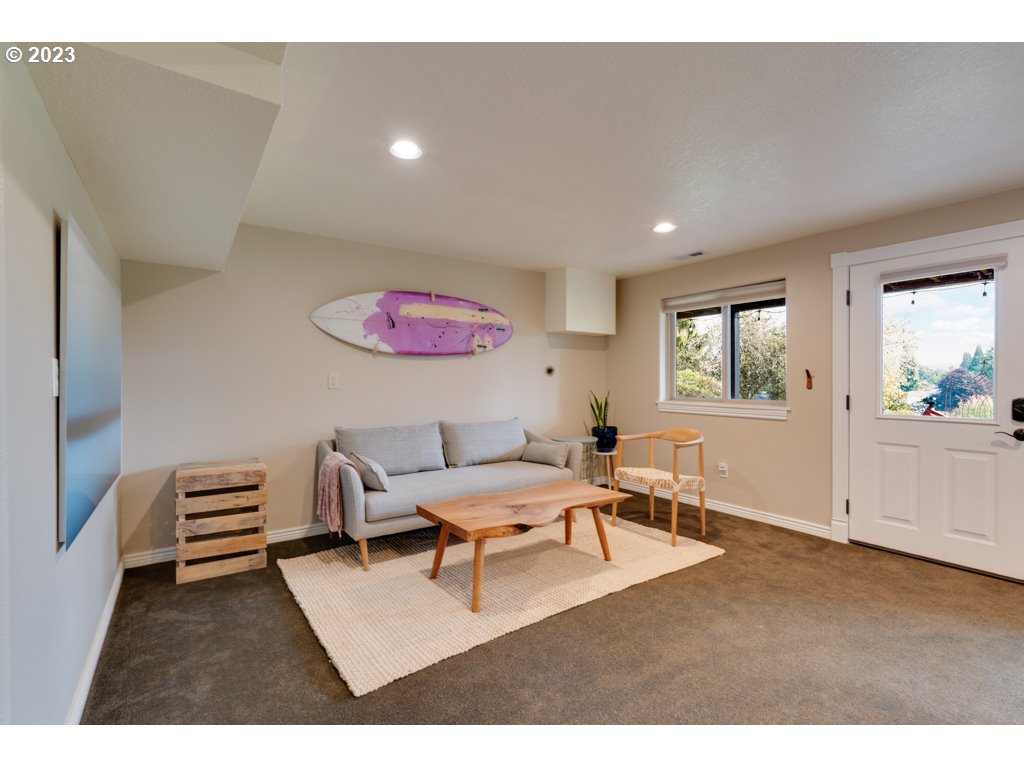 3250 P Street Washougal, WA 98671 - Photo 33 of 48 a living room with furniture and a table